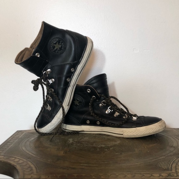 chucks black leather